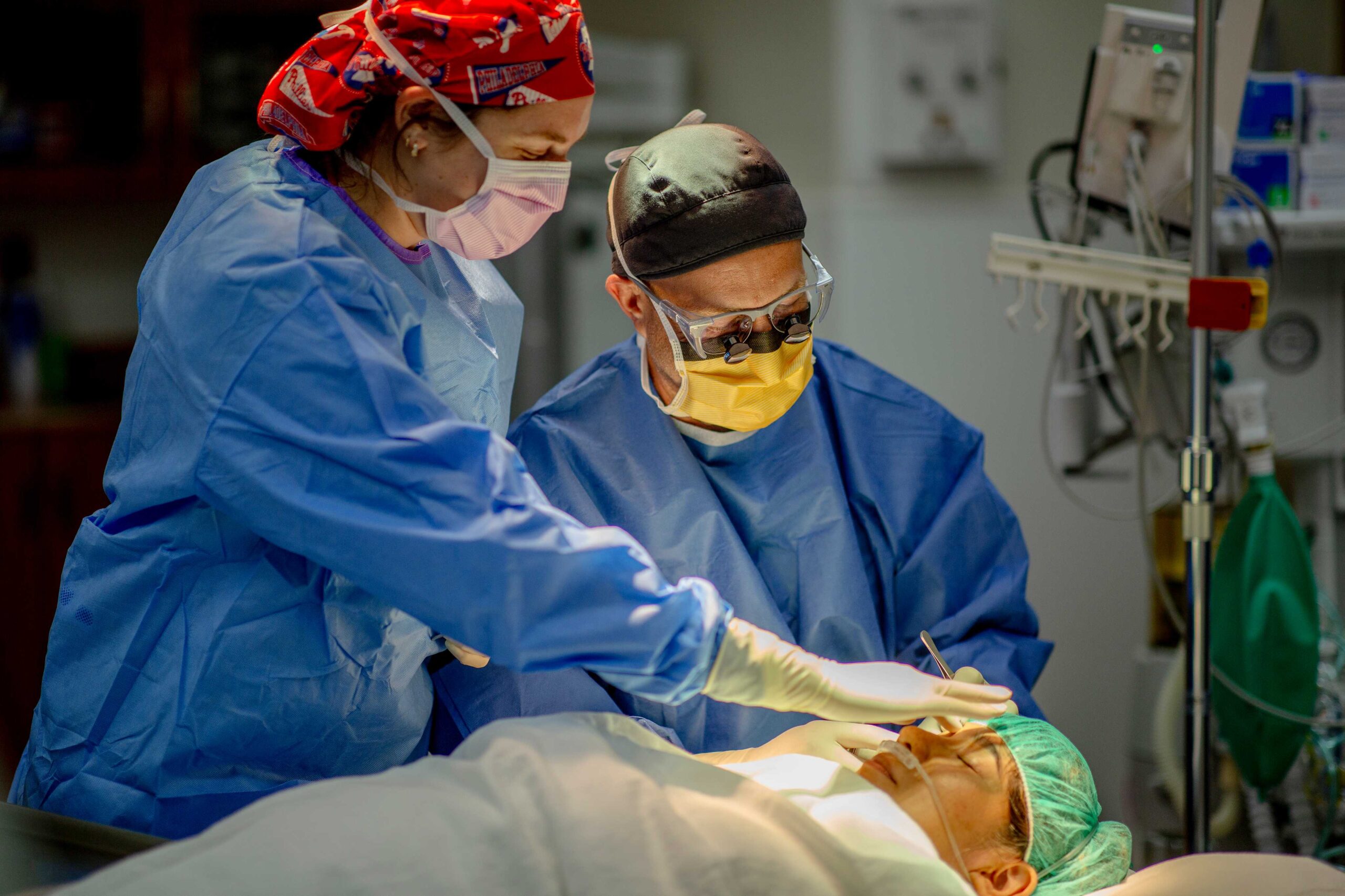 Close-up of eyelid lift surgery with surgical tools at Seiff Center