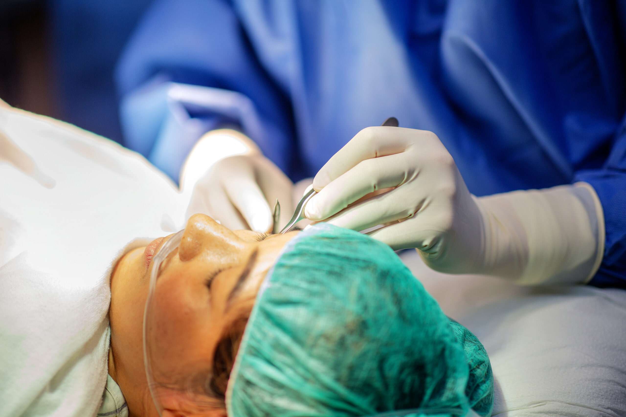 Specialist performing pre-surgical evaluation for eyelid procedure at Seiff Center