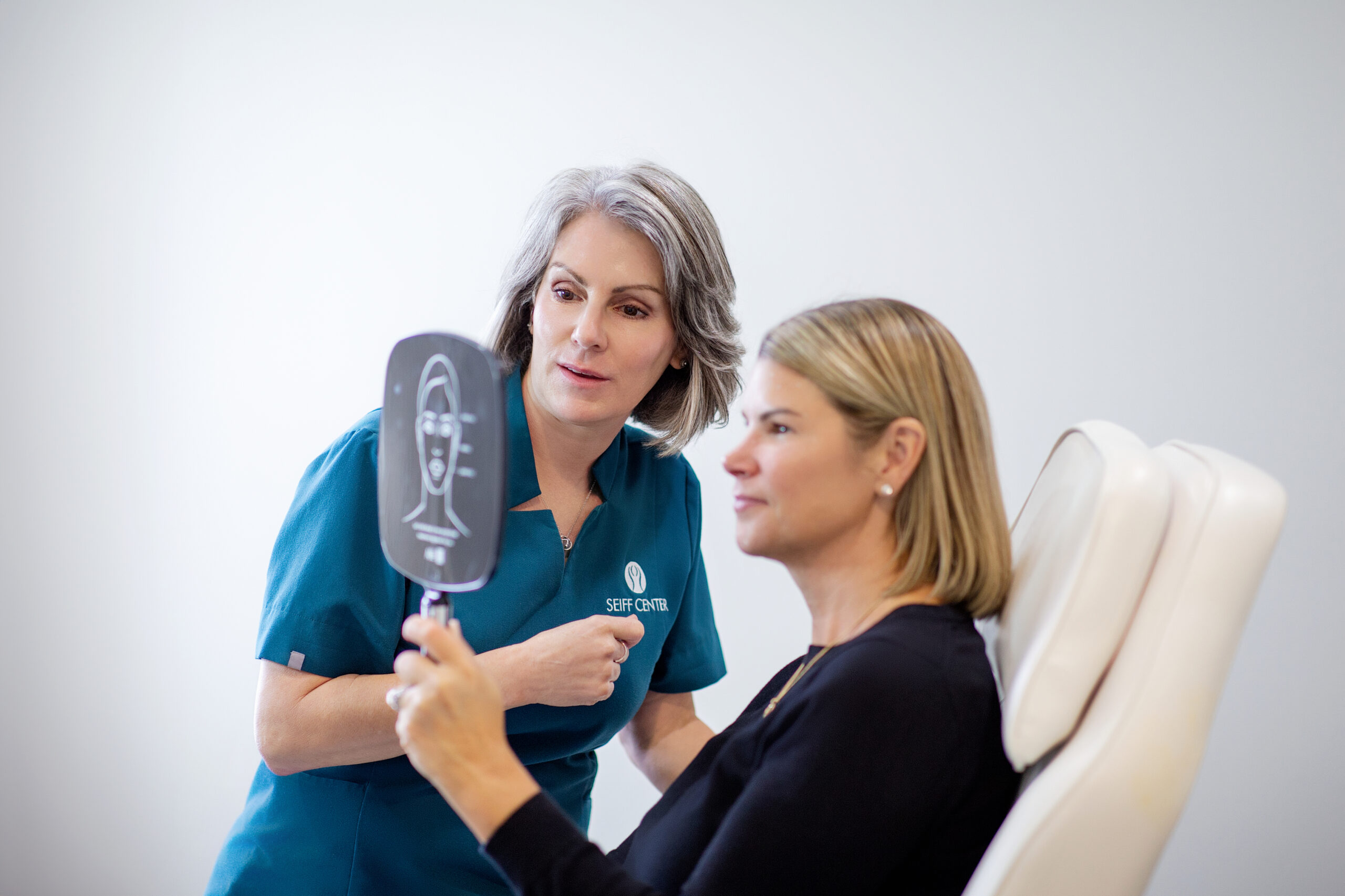 Aesthetic provider preparing treatment materials at Seiff Center medispa