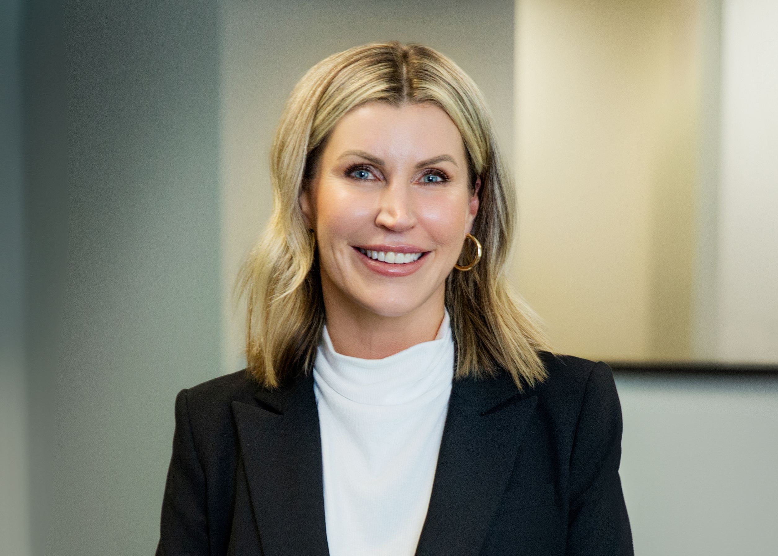 Megan Scarano in a suit