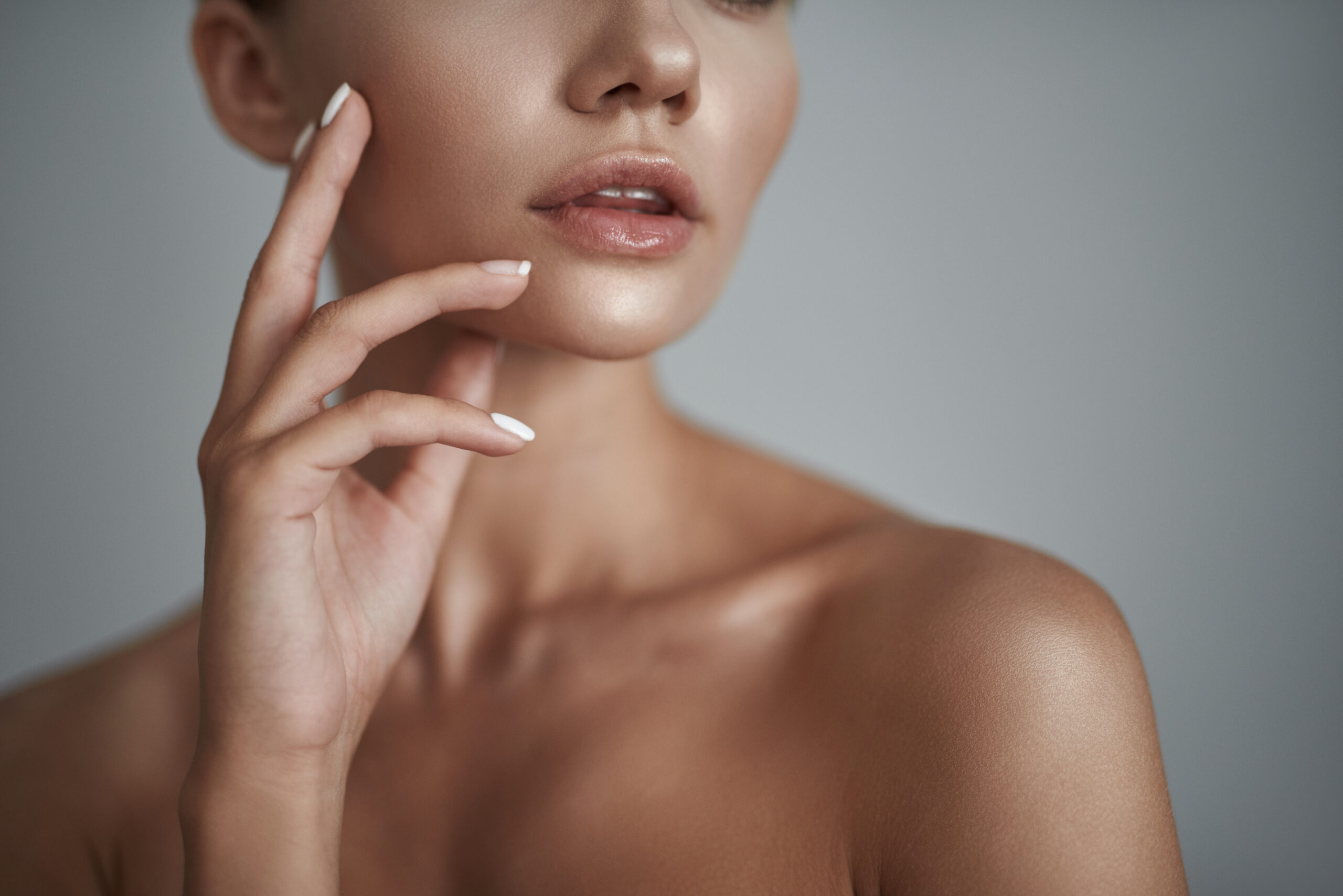 Woman posing after receiving professional facial skincare treatment at Seiff Center medispa